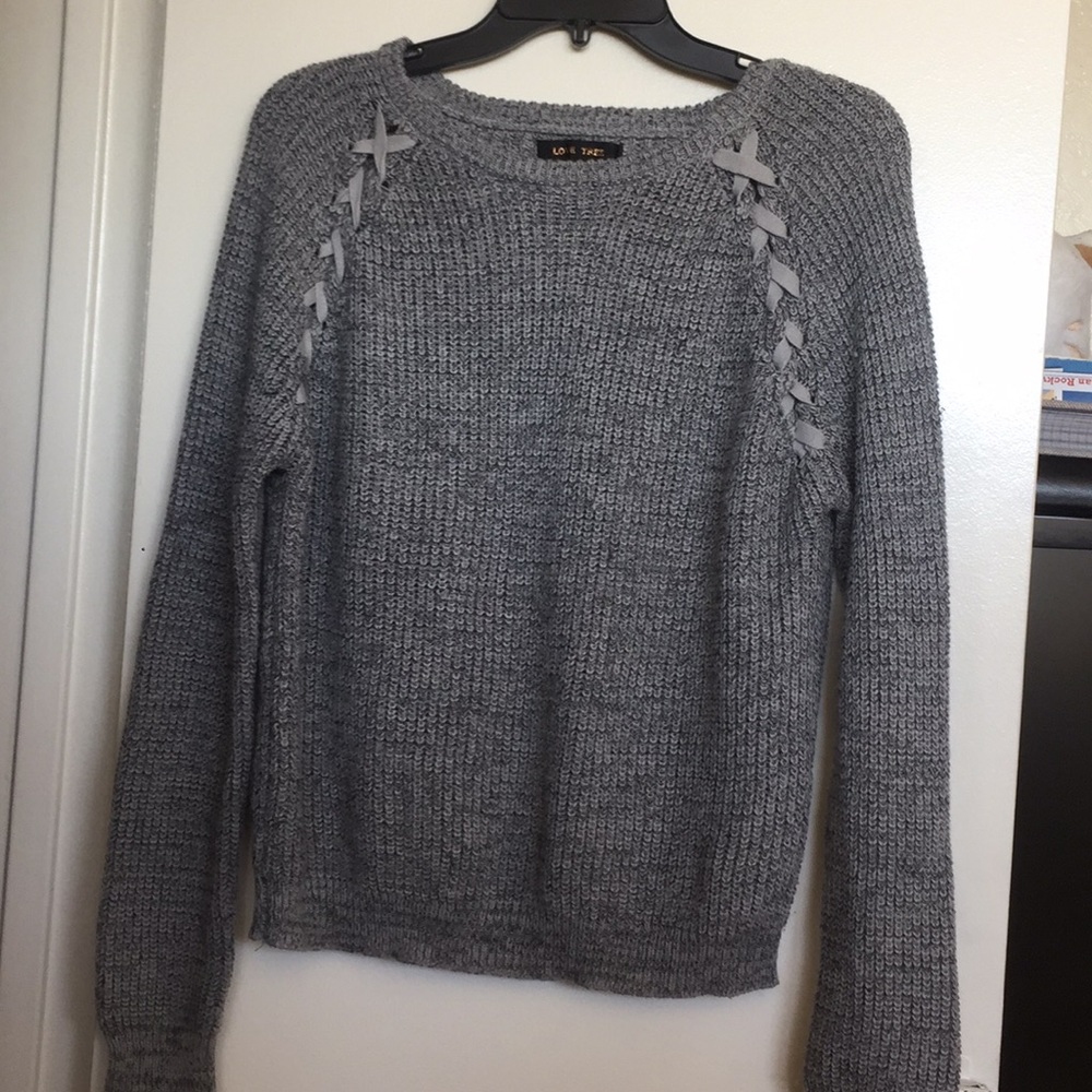 Criss-cross dark grey accent sweater